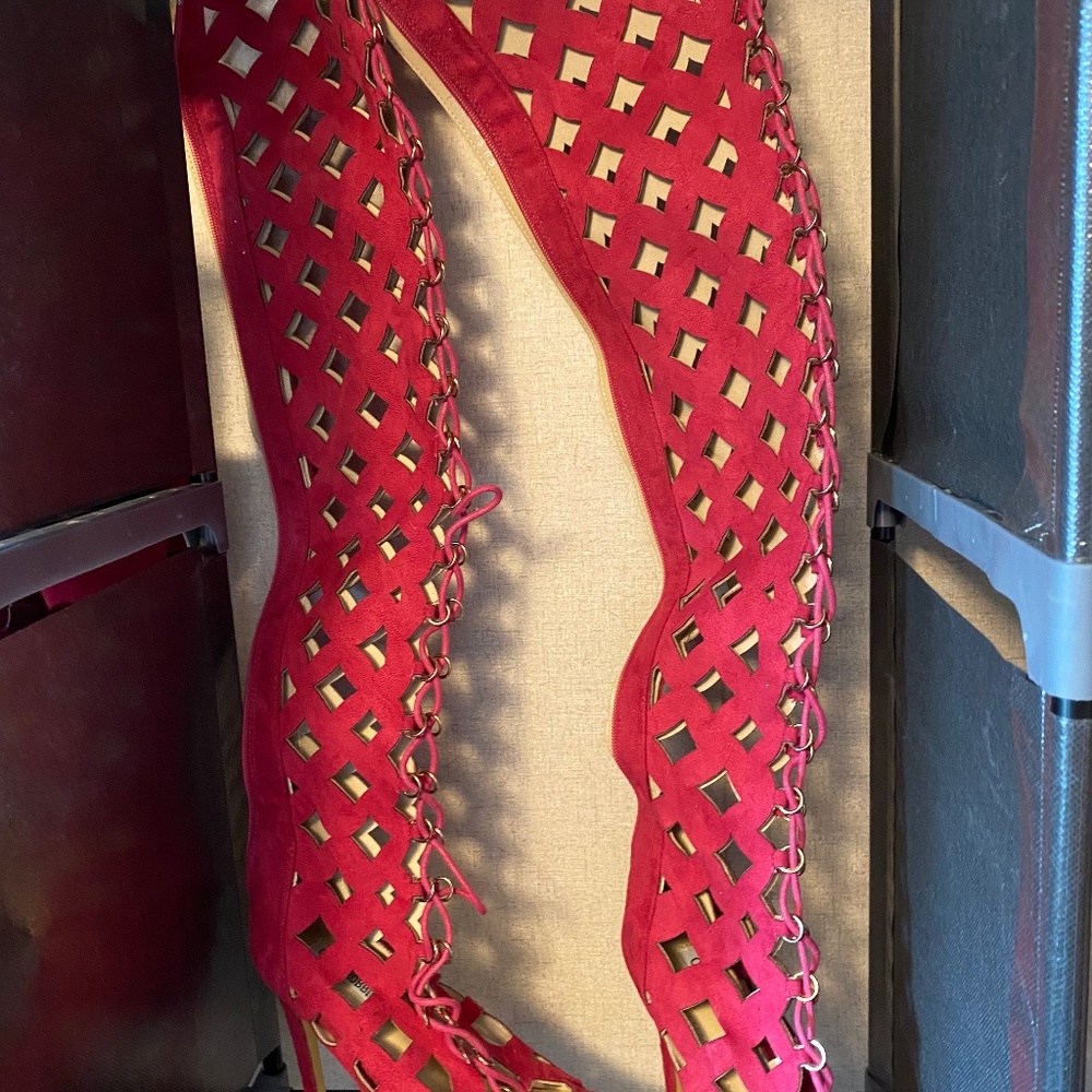 Thigh high pink cut out heel boots